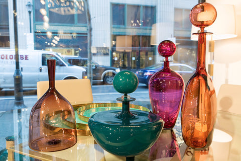 Bottles, Buddha, and Brass